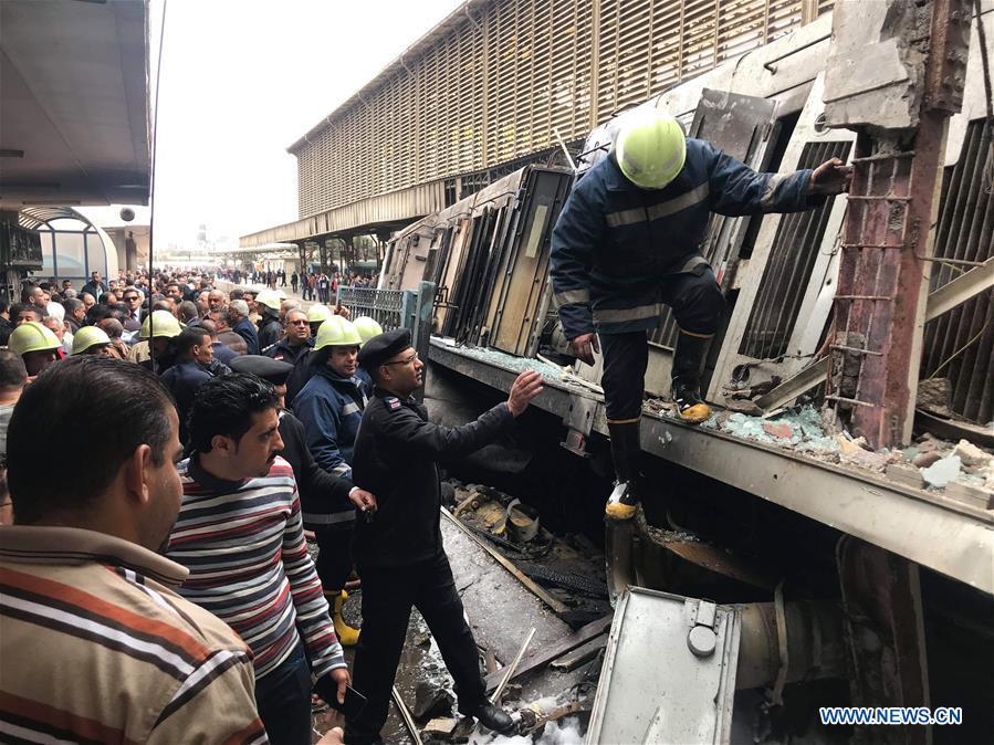Rescuers work at a fire site at a train station in Cairo, Egypt, Feb. 27, 2019. At least 25 people were killed and more than 40 others wounded when a fire erupted inside the main train station in the city center of Egypt\'s capital Cairo on Wednesday, state-run Nile TV reported. (Xinhua/Ahmed Gomaa)