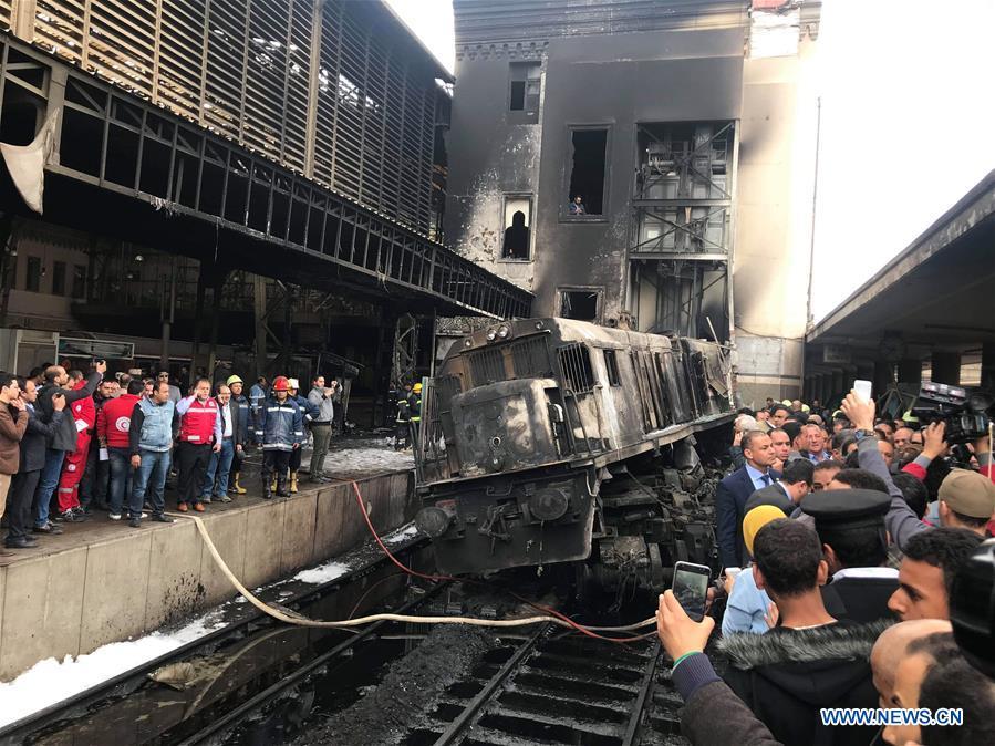 Photo taken on Feb. 27, 2019 shows a fire site at a train station in Cairo, Egypt. At least 25 people were killed and more than 40 others wounded when a fire erupted inside the main train station in the city center of Egypt\'s capital Cairo on Wednesday, state-run Nile TV reported. (Xinhua/Ahmed Gomaa)