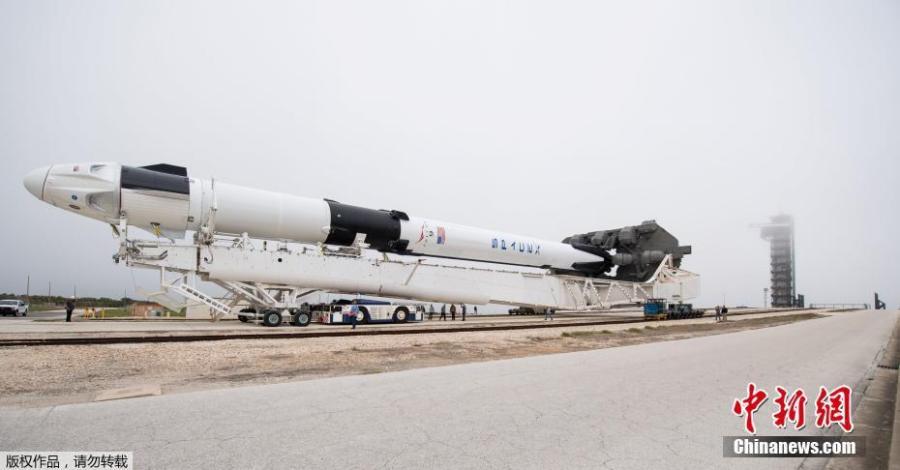 A SpaceX Falcon 9 rocket with the company\'s Crew Dragon spacecraft onboard is seen as it is rolled to the launch pad at Launch Complex 39A as preparations continue for the Demo-1 mission, Feb. 28, 2019 at NASA\'s Kennedy Space Center in Florida. The Demo-1 mission will be the first launch of a commercially built and operated American spacecraft and space system designed for humans as part of NASA\'s Commercial Crew Program. (Photo/Agencies)