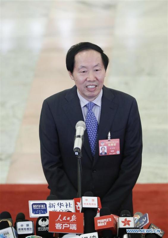 Liu Yuzhu, head of the National Cultural Heritage Administration, receives an interview after the opening meeting of the second session of the 13th National Committee of the Chinese People\'s Political Consultative Conference (CPPCC) at the Great Hall of the People in Beijing, capital of China, March 3, 2019. (Xinhua/Shen Bohan)
