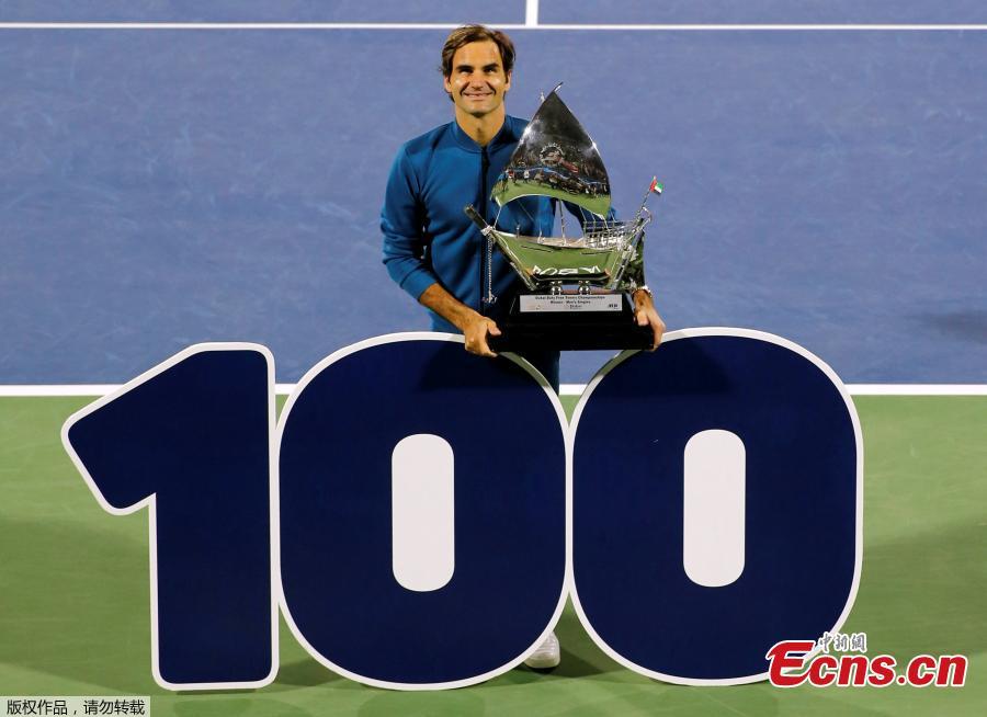 Roger Federer of Switzerland holds his trophy after winning the final match at the Dubai Duty Free Tennis Championship against Stefanos Tsitsipas of Greece, in Dubai, United Arab Emirates, March 2, 2019. Roger Federer claimed the 100th ATP title of his career by beating 20-year-old Greek Stefanos Tsitsipas 6-4 6-4. The 20-times Grand Slam champion became the second man in the Open Era to win 100 titles, after American Jimmy Connors who won 109. (Photo/Agencies)