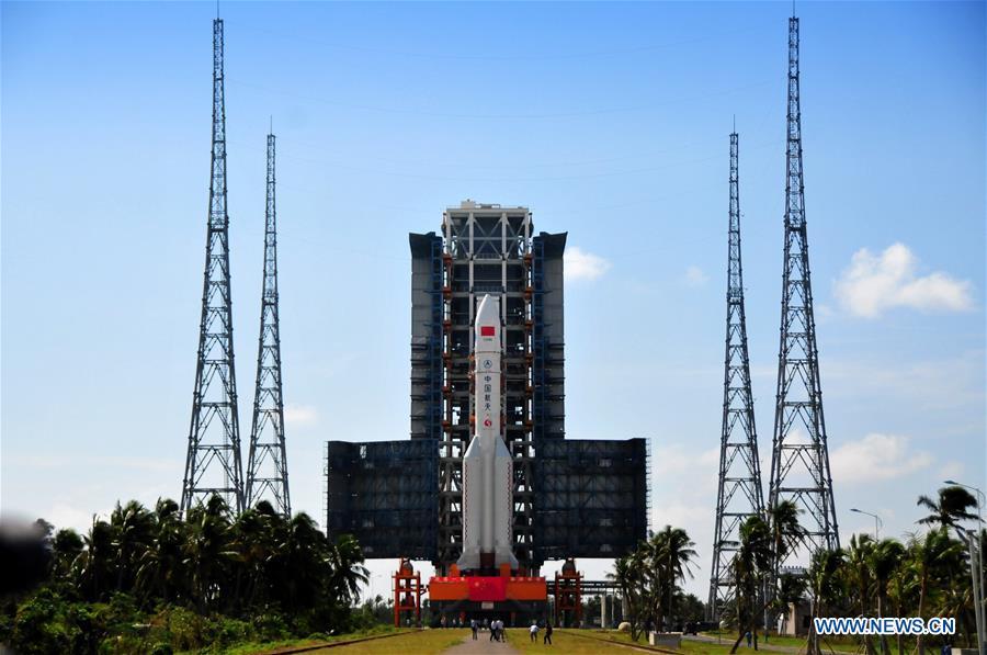 China\'s newly-developed heavy-lift carrier rocket Long March-5 is in transit at the Wenchang Space Launch Center in south China\'s Hainan Province, Oct. 28, 2016. The China Manned Space Engineering Office (CMSEO) announced Monday that the core module of the country\'s space station, the Long March-5B carrier rocket and its payloads will be sent to the launch site in the second half of this year, to make preparations for the space station missions. China is scheduled to complete the construction of the space station around 2022. It will be the country\'s space lab in long-term stable in-orbit operation. (Xinhua/Sun Hao)