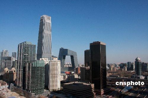 Beijing\'s CBD area. (Photo/China News Service)
Key points:
-- Lower electricity costs in manufacturing, and cut the average electricity price for general industrial and commercial businesses by another 10 percent.

-- Within two years, almost all expressway toll booths will be removed at provincial borders.