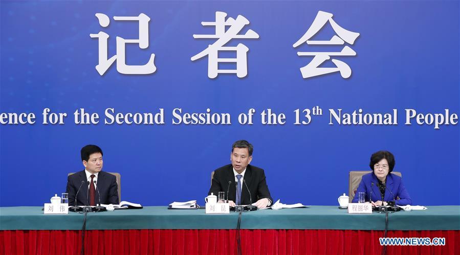 China\'s Minister of Finance Liu Kun (C), and vice ministers Cheng Lihua (R) and Liu Wei attend a press conference on the country\'s fiscal and tax reforms and fiscal work for the second session of the 13th National People\'s Congress in Beijing, capital of China, March 7, 2019. (Xinhua/Shen Bohan)