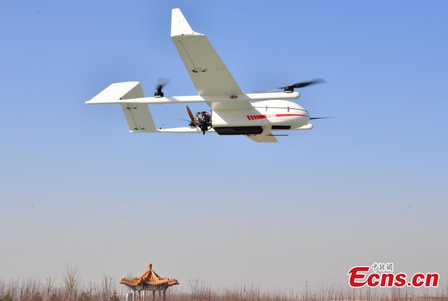 A drone put into use by Chengguan, urban management officers, in Shijiazhuang City, Hebei Province, March 7, 2019. The drone, with a wingspan of four meters, is used to take aerial photos of an area 138 square kilometres in size, to aid Chengguan in spotting open-air garbage and unapproved construction. (Photo: China News Service/Zhai Yujia)