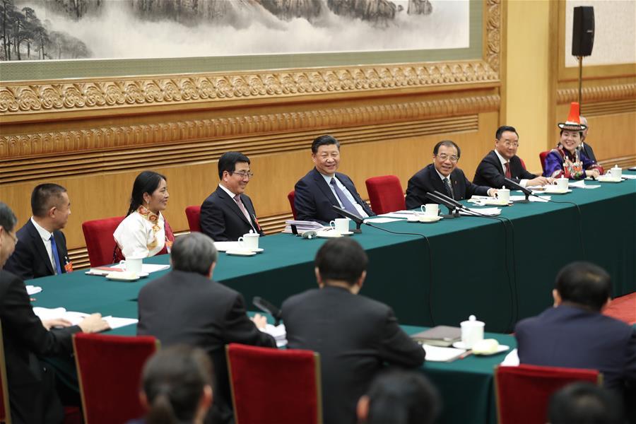 Chinese President Xi Jinping, also general secretary of the Communist Party of China (CPC) Central Committee and chairman of the Central Military Commission, joins deliberation with deputies from Gansu Province at the second session of the 13th National People\'s Congress in Beijing, capital of China, March 7, 2019. (Xinhua/Wang Ye)