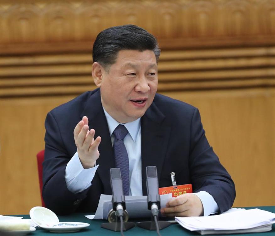Chinese President Xi Jinping, also general secretary of the Communist Party of China (CPC) Central Committee and chairman of the Central Military Commission, joins deliberation with deputies from Gansu Province at the second session of the 13th National People\'s Congress in Beijing, capital of China, March 7, 2019. (Xinhua/Ju Peng)