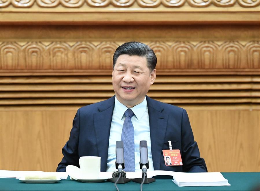 Chinese President Xi Jinping, also general secretary of the Communist Party of China (CPC) Central Committee and chairman of the Central Military Commission, joins deliberation with deputies from central China\'s Henan Province at the second session of the 13th National People\'s Congress in Beijing, capital of China, March 8, 2019. (Xinhua/Xie Huanchi)