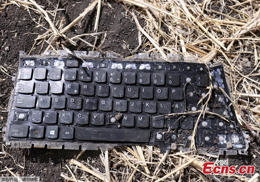 A laptop keyboard is seen at the scene of the Ethiopian Airlines Flight ET 302 plane crash, near the town of Bishoftu, southeast of Addis Ababa, Ethiopia March 11, 2019. Two flight data recorders from Ethiopian Airlines Flight ET302 were found Monday. (Photo/Agencies)