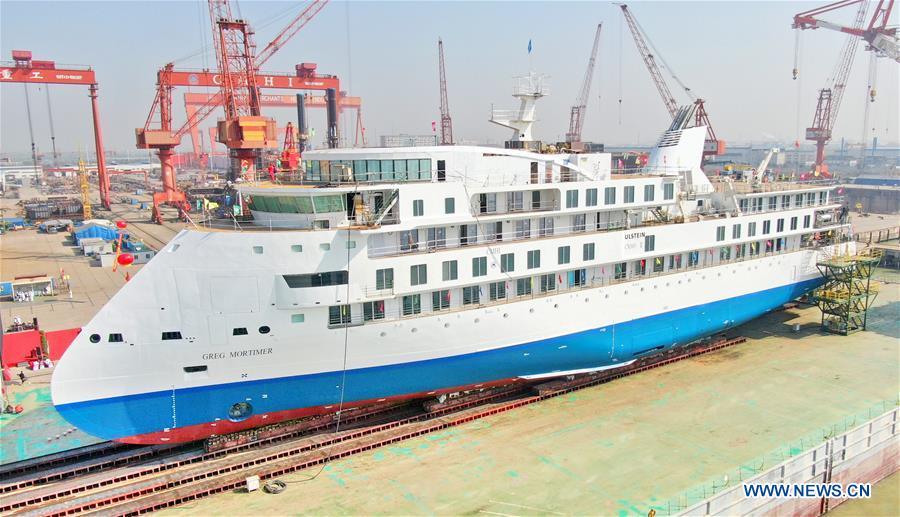 Photo taken on March 12, 2019 shows the first China-made cruise ship for polar expeditions, in Haimen, east China\'s Jiangsu Province. The first China-made cruise ship for polar expeditions tested the water on Tuesday in Haimen, east China\'s Jiangsu Province. Hu Xianfu, general manager of the shipbuilder China Merchants Group, said the 104.4-meters long vessel is 18.4 meters at the beam. It can operate at a speed of 15.5 knots. With a gross tonnage of 7,400 tonnes, it can accommodate 255 people on board. (Xinhua/Xu Congjun)