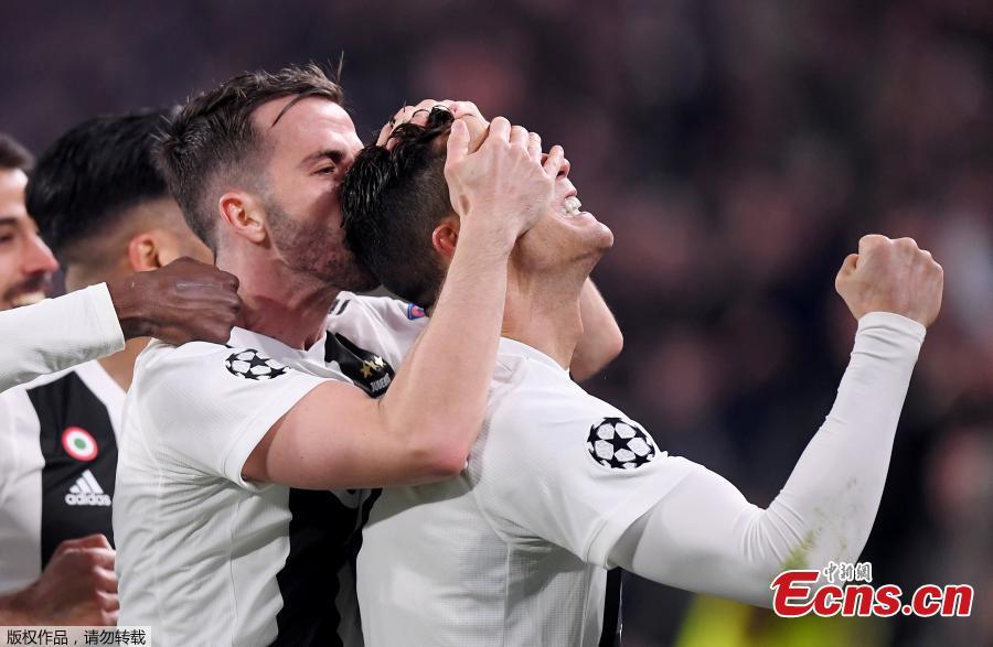 Juventus\'s players celebrate after winning the UEFA Champions League round 16 second leg match between Juventus and Atletico Madrid in Turin, Italy, Mar.12, 2018. Juventus won 3-0.  (Photo/Agencies)
