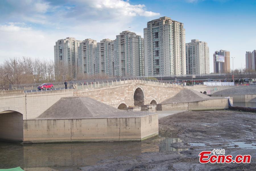 Photo taken on March 13, 2019 shows the Yongtong Bridge in Beijing. The bridge, established in 1446, is a cultural relic under state protection and also part of the Grand Canal, a vast waterway and a UNESCO world culture heritage site. A new bridge has been constructed that will soon be put into use, diverting vehicle traffic from the historical bridge, which will receive better conservation. (Photo: China News Service/Jia Tianyong)