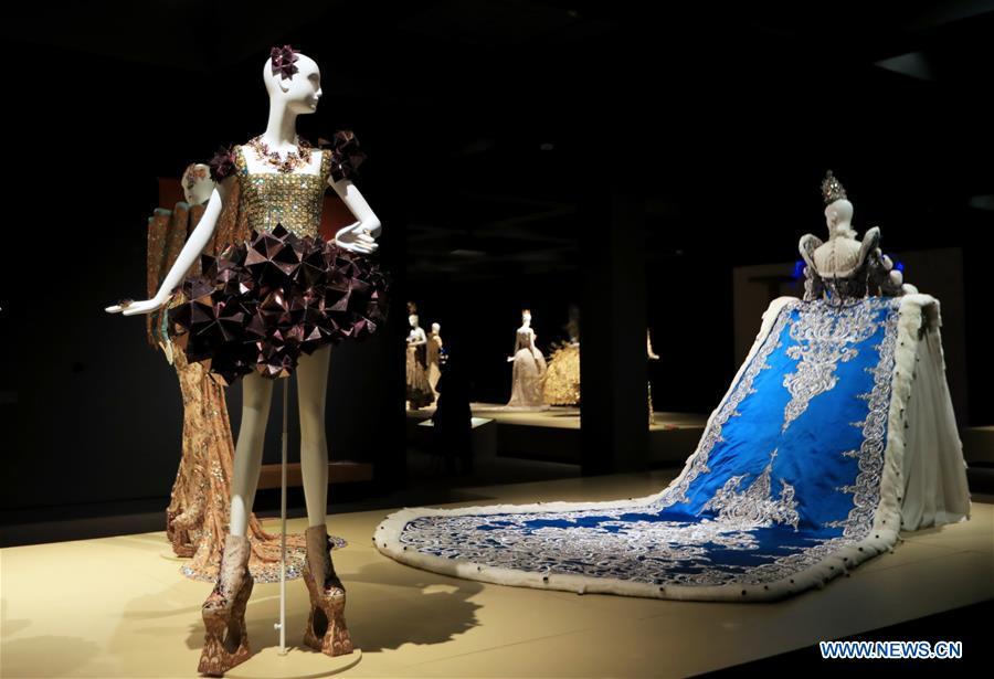 Photo taken on March 7, 2019 shows creations of Chinese couturier Guo Pei at her \