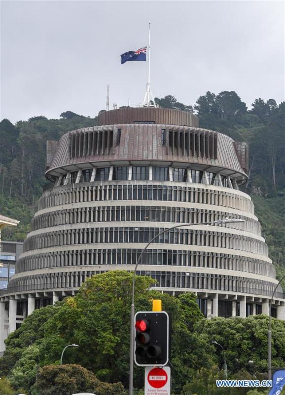 A New Zealand\'s national flag flies at half-mast in front of the parliament buildings in Wellington, capital of New Zealand, on March 16, 2019. Gunmen opened fire in two separate mosques in Christchurch on Friday, killing 49 people and wounding 48 others. (Xinhua/Guo Lei)