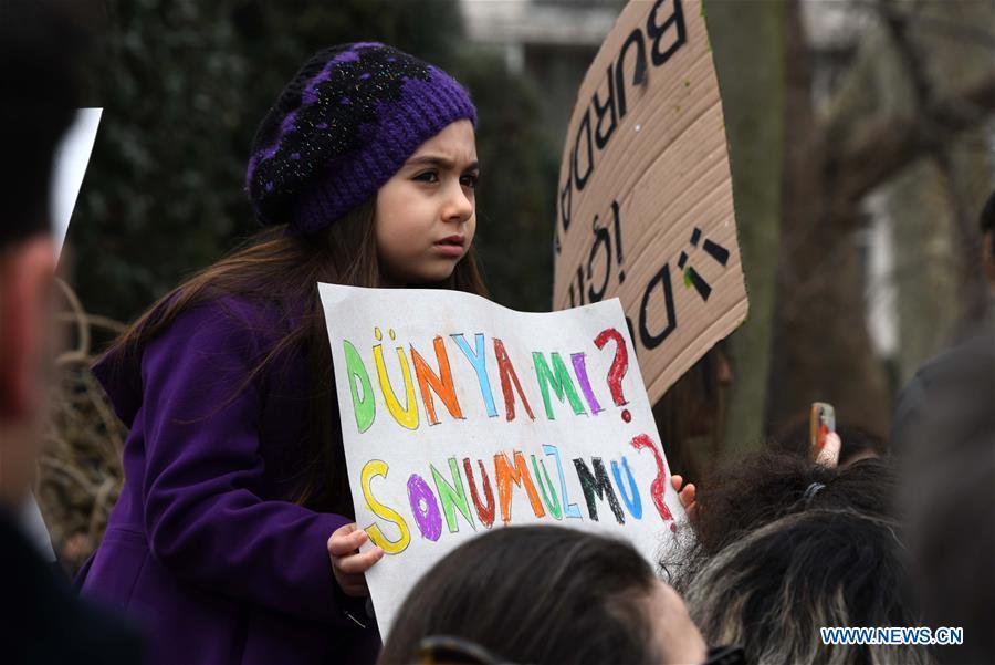 A pupil attends a rally at Bebek Park, Istanbul, Turkey, on March 15, 2019. About 100 Turkish pupils missed school on Friday to gather together in a park along the Bosphorus Strait to appeal for action on climate change. (Xinhua/Xu Suhui)