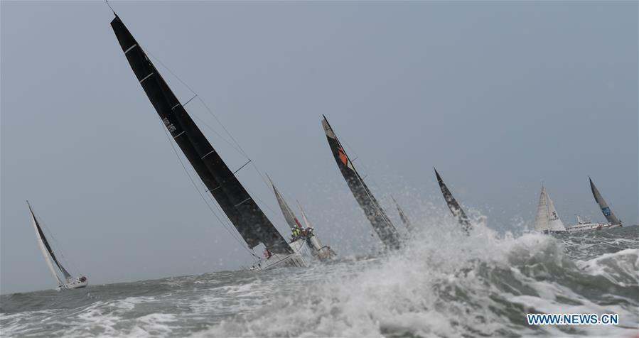Yachts compete during the Haikou Offshore Race at the 2019 Round Hainan Regatta in Haikou, capital of south China\'s Hainan Province, March 16, 2019. (Xinhua/Yang Guanyu)