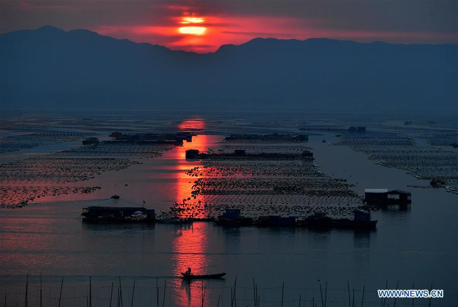 Photo taken on March 16, 2019 shows the sunrise view of Weijiang Village of Xiapu County, southeast China\'s Fujian Province. (Xinhua/Wei Peiquan)