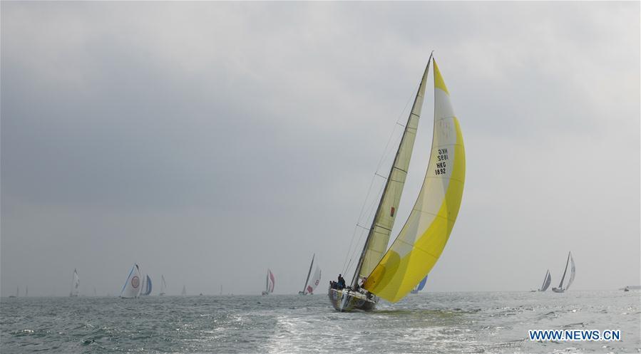 Yachts compete during the offshore race from Haikou to Sanya at the 2019 Round Hainan Regatta in Haikou, capital of South China\'s Hainan province, March 17, 2019. (Photo/Xinhua)