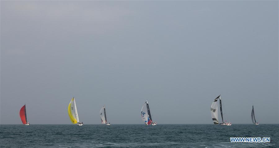 Yachts compete during the offshore race from Haikou to Sanya at the 2019 Round Hainan Regatta in Haikou, capital of South China\'s Hainan province, March 17, 2019. (Photo/Xinhua)