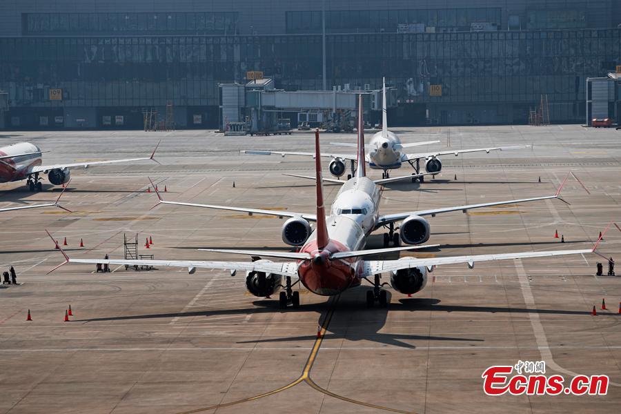 Boeing 737 MAX planes of Shanghai Airlines are grounded at Hongqiao International Airport in Shanghai, March 17, 2019. Boeing Co said on Friday its software upgrade for the grounded 737 MAX jetliner will be rolled out in the coming weeks. (Photo: China News Service/Yin Liqin)