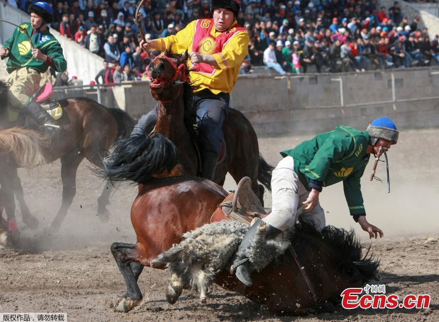 Horsemen take part in a Kok-boru, or goat dragging competition as part of Navruz celebrations, an ancient holiday marking the spring equinox, in Bishkek, Kyrgyzstan, March 18, 2019. (Photo/Agencies)