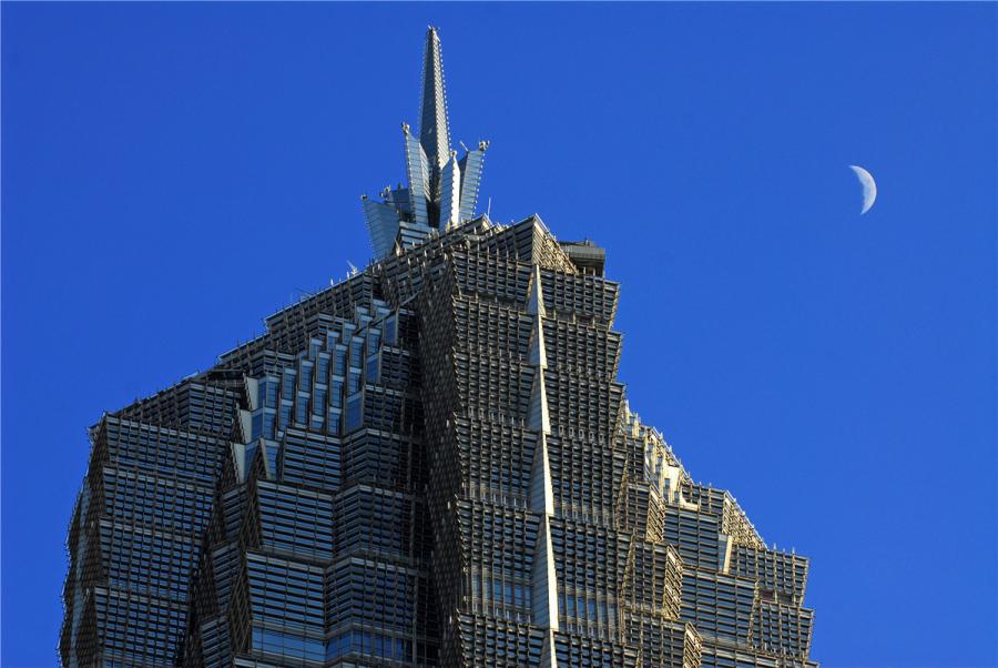 <?php echo strip_tags(addslashes(The building contains a shopping mall, offices and the Grand Hyatt Shanghai hotel, which at the time of completion was the highest hotel in the world. (Photo by Zheng Xianzhang/for chinadaily.com.cn))) ?>