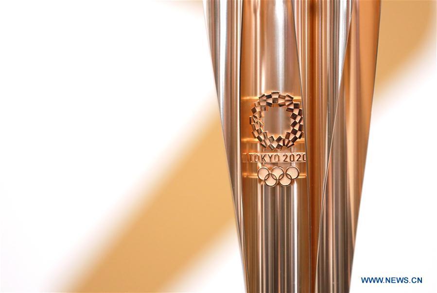 Photo taken in Tokyo, Japan on March 20, 2019 shows the detail of the Tokyo 2020 Olympic Torch. The Tokyo Organising Committee of the Olympic and Paralympic Games (Tokyo 2020) unveiled the prototype of the Tokyo 2020 Olympic Torch on Wednesday. The motif of Tokyo 2020 Olympic Torch is cherry blossom. Aluminum recycled from temporary housing used in areas struck by the Great East Japan Earthquake disaster will be used to manufacture the torch. (Xinhua/Du Xiaoyi)