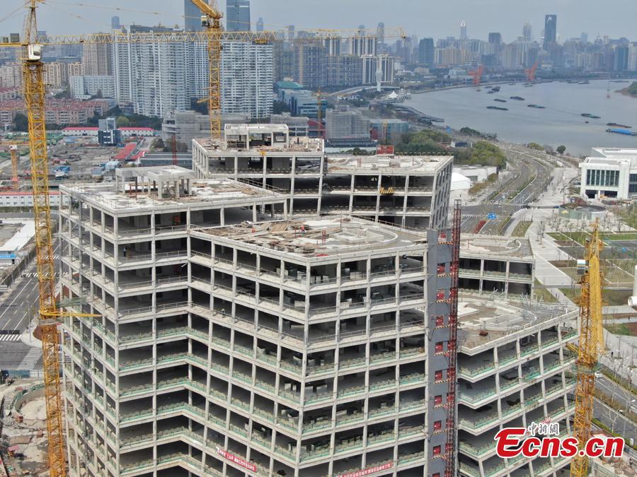 <?php echo strip_tags(addslashes(A building complex designed by Japanese architect Kazuyo Sejima looks unusual in Shanghai, with its seven buildings leaning against each other. The building roofs have been capped recently. (Photo: China News Service/Zhang Hengwei))) ?>