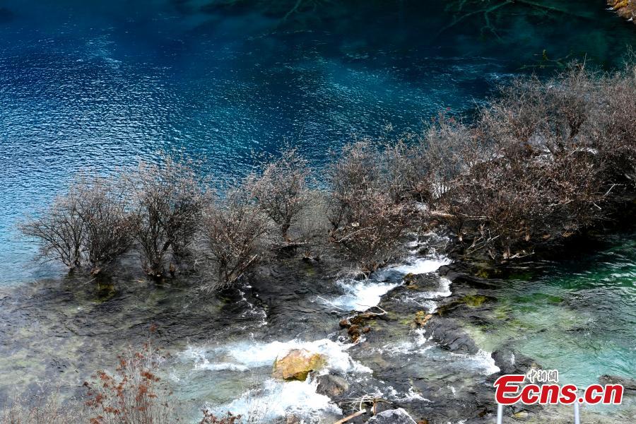 Snow and ice begin to melt as spring arrives in the Jiuzhaigou Valley Scenic Area in Sichuan Province, a UNESCO world heritage site, March 25, 2019. Jiuzhaigou, which literally means \