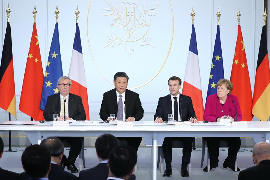Chinese President Xi Jinping (2nd L), French President Emmanuel Macron (2nd R), German Chancellor Angela Merkel (1st R) and European Commission President Jean-Claude Juncker attend the closing ceremony of a global governance forum co-hosted by China and France in Paris, France, March 26, 2019. (Xinhua/Ju Peng)