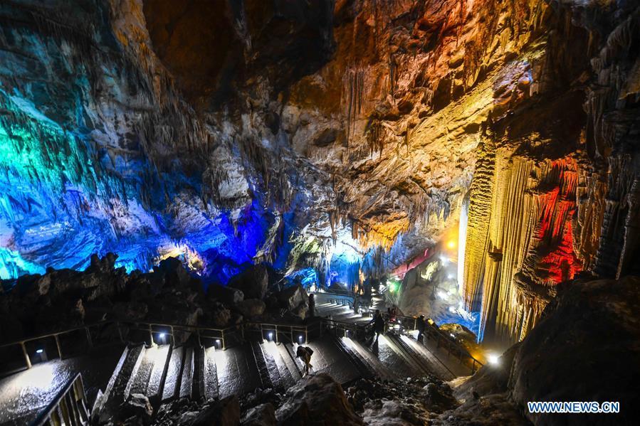 Tourists view the karst landscape inside the Furong Cave in Wulong District of Chongqing, southwest China, March 26, 2019. The Wulong Furong Cave was listed as a UNESCO world natural heritage site in 2007. (Xinhua/Dong Jianghui)