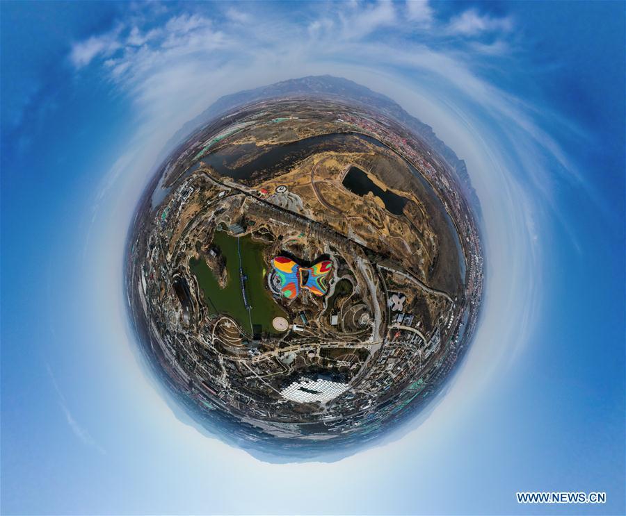 Computer-integrated aerial photo taken on March 26, 2019 shows the Guirui Theater in the center at the site of the International Horticultural Exhibition 2019 Beijing China (Expo 2019 Beijing) in Yanqing District of Beijing, capital of China. The 2019 Beijing International Horticultural Exhibition is slated to kick off on April 29, 2019. (Xinhua/Wang Jianhua)