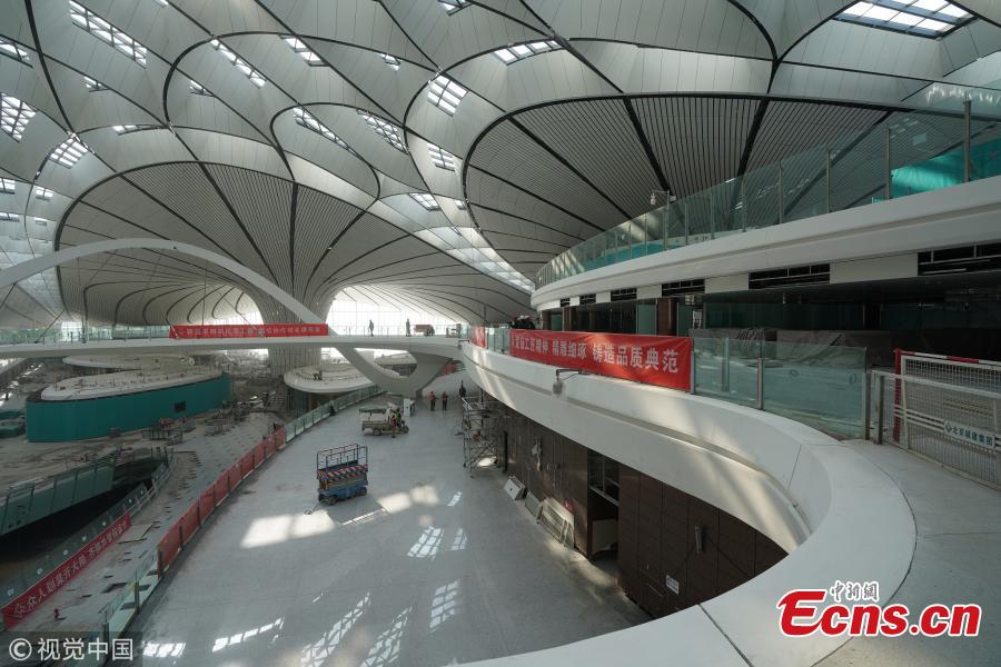 An inside view of the Beijing Daxing International Airport, which will be put into operation before September 30. The new airport sits at the junction of Beijing\'s southern Daxing District and Langfang, a city in Hebei Province. It is expected to handle 45 million passengers annually by 2021 and 72 million by 2025. (Photo/VCG)