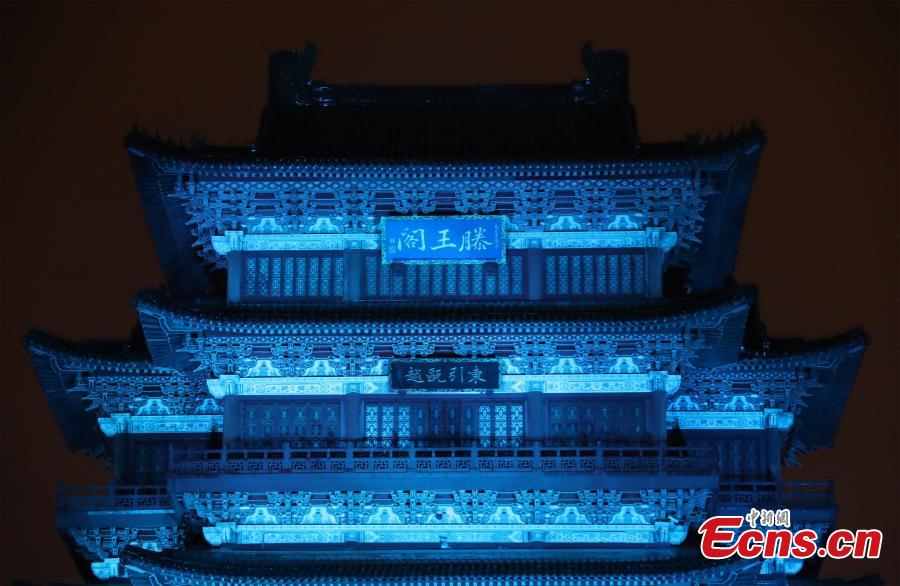 <?php echo strip_tags(addslashes(The historical Pavilion of Prince Teng is illuminated by blue lights during an event to mark World Autism Awareness Day, in Nanchang City, Jiangxi Province, April 2, 2019. The pavilion is on the east bank of the Ganjiang River and is one of the Three Great Towers of southern China. A total of 16 historical and cultural buildings in China took part in the light-up event to mark the day, which aims to raise awareness with Autism Spectrum Disorder throughout the world. (Photo: China News Service/Liu Zhankun))) ?>