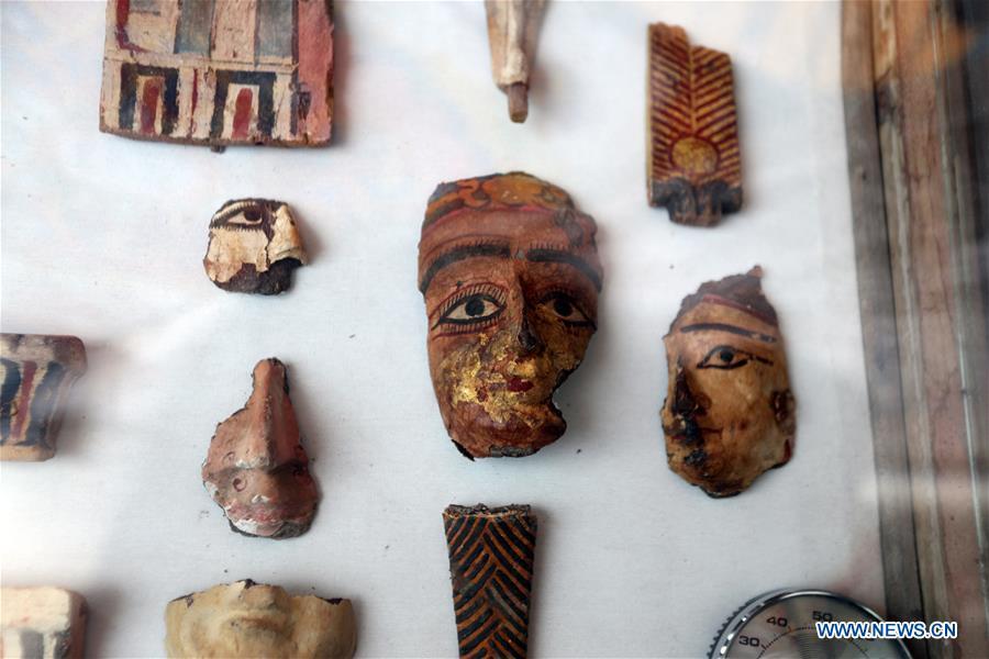 Photo taken on April 5, 2019 shows the antiquities discovered in a tomb in Sohag, Egypt. The Egyptian Minister of Antiquities announced on Friday the discovery of a tomb, dating back to the Ptolemaic era which spans from 305 BC to 30 BC, in Sohag province south of the capital Cairo. (Xinhua/Ahmed Gomaa)