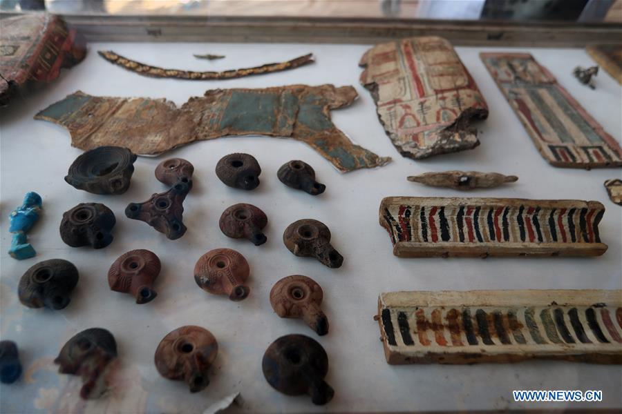 Photo taken on April 5, 2019 shows the antiquities discovered in a tomb in Sohag, Egypt. The Egyptian Minister of Antiquities announced on Friday the discovery of a tomb, dating back to the Ptolemaic era which spans from 305 BC to 30 BC, in Sohag province south of the capital Cairo. (Xinhua/Ahmed Gomaa)
