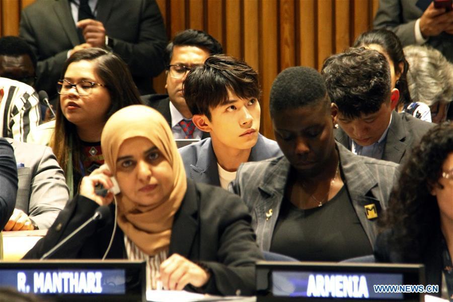 Chinese singer Yi Yangqianxi (C), who is a World Health Organization (WHO) China special envoy for health, attends the Asia and Pacific session of the United Nations Economic and Social Council Youth Forum, at the UN headquarters in New York, April 8, 2019. Yi Yangqianxi on Monday shared his vision of promoting health among young people, citing his experiences working with the World Health Organization (WHO). (Xinhua/Xie E)