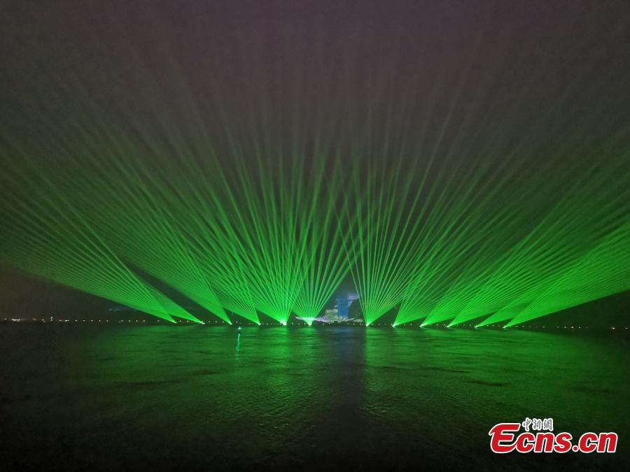 A stunning light show is staged in Wenzhou City, Zhejiang Province, April 8, 2019. The light show has made use of the Shengmeijian Mountain and water area as well as the city\'s buildings to present different light effects. The show covers a mountain area of 9.5 million square meters, and is said to be the largest such project in China. (Photo: China News Service/Zhang Yin)