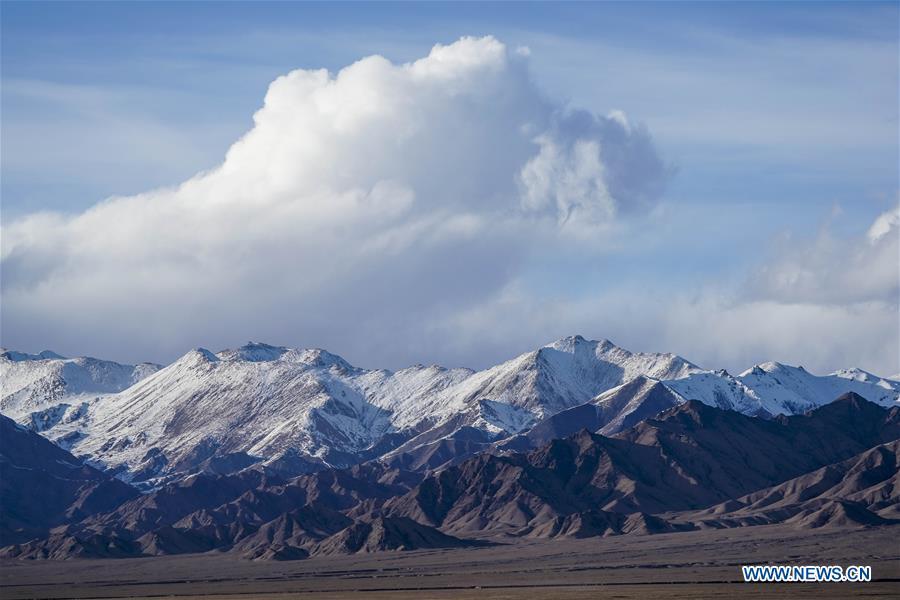 Photo taken on March 30, 2019 shows snow mountains in the Altun Mountains National Nature Reserve in northwest China\'s Xinjiang Uygur Autonomous Region. Altun Mountain National Nature Reserve saw the number of three rare wild animals reach around 100,000, according to local researchers. The population of wild yak, Tibetan antelope and wild ass is recovering to the level of recorded data in the 1980s when the reserve was first set up, the results of the latest scientific investigation showed. The reserve suspended all mining activities within its 46,800-square-km parameter in 2018 in an effort to restore its environment. (Xinhua/Hu Huhu)