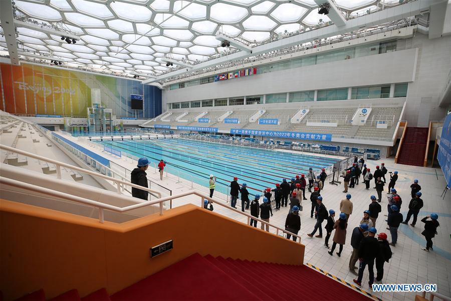 Photo taken on April 8, 2019 shows representatives from major world news agencies in the National Aquatics Center during a venue visit prior to the first World Agency Meeting of Beijing 2022, in Beijing, capital of China. Representatives from major world news agencies are visiting Beijing for a first look at some of the facilities to be used at the 2022 Winter Olympic Games. (Xinhua/Xu Zijian)