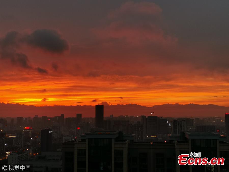 Buildings silhouetted at sunset in Chengdu City, Sichuan Province, April 10, 2019. (Photo/VCG)