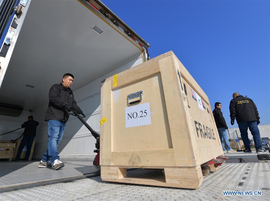Logistics staff load Chinese cultural relics transported from Italy, which have been cleared by the customs, into trucks, at Beijing International Airport in Beijing, capital of China, April 10, 2019. A total of 796 Chinese cultural relics arrived at Beijing International Airport at 6:54 a.m. Wednesday after an eight-hour flight from Italy. The group of Chinese artifacts were first noticed by a unit of Carabinieri, or the national gendarmerie of Italy, on the local relics auction market in 2007, which was followed by a domestic judicial trial. (Xinhua/Li He)