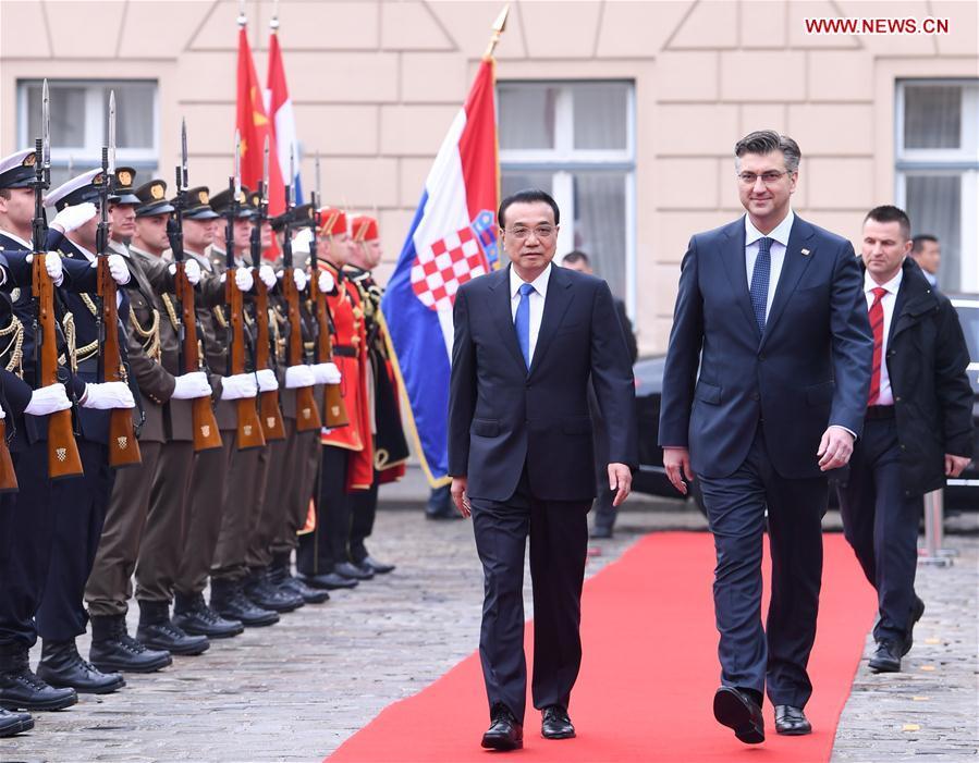 <?php echo strip_tags(addslashes(Chinese Premier Li Keqiang (L, front) attends a grand welcome ceremony held by Croatian Prime Minister Andrej Plenkovic (R, front) at the St. Mark's Square in Zagreb, Croatia, April 10, 2019. Li held talks with Plenkovic in the Croatian capital of Zagreb on Wednesday. (Xinhua/Shen Hong))) ?>