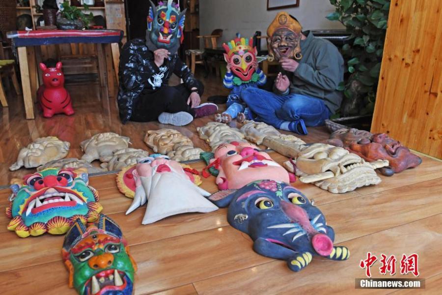 <?php echo strip_tags(addslashes(Ma Lande shows masks of the Nuo Opera at his studio in Lanzhou City, Northwest China's Gansu Province, April 14, 2019. The handicraftsman said he has made more than 2,000 Nuo Opera masks in the past 17 years, depicting a broad range of topics, including mythical figures from Chinese legends and classic novels. Masks, usually carved out of willow or camphor wood, are an important part of Nuo Opera, an ancient folk drama still popular in some parts of China. The purpose of Nuo Opera is to drive away devils, disease and evil influences, and also to petition the gods for their blessings. (Photo: China News Service/Yang Yanmin))) ?>