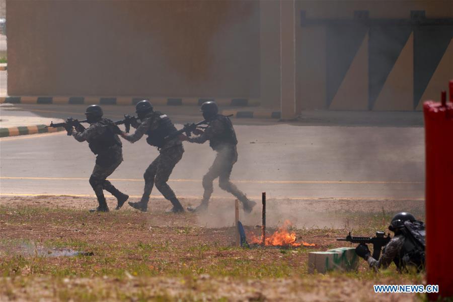 <?php echo strip_tags(addslashes(Soldiers of the Jordan Armed Forces (JAF) perform an anti-terror drill on the opening ceremony of the 11th annual Warrior Competition at the King Abdullah II Special Operations Training Center (KASOTC) in Amman, Jordan, April 14, 2019. (Xinhua/Lin Xiaowei))) ?>