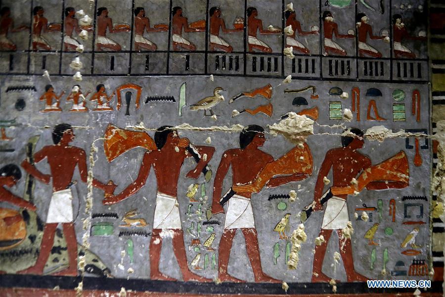 Photo taken on April 13, 2019 shows the paintings in a tomb in Saqqara, Egypt. Egyptian Ministry of Antiquities opened on Saturday a tomb of a Fifth Dynasty dignitary which was discovered recently at Saqqara Necropolis near the Giza pyramids. Minister of Antiquities Khaled al-Anany, along with 52 ambassadors and cultural attaches of foreign, Arab and African countries, toured Saqqara Necropolis to inspect the tomb of Khuwy, who lived at the end of the Fifth Dynasty of the Old Kingdom. The Old Kingdom of Egypt is the period spanning 2686 BC to 2181 BC, which is also known as the Age of the Pyramids. (Xinhua/Ahmed Gomaa)