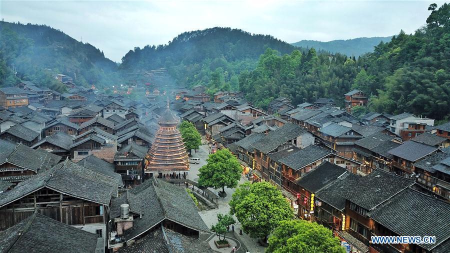 <?php echo strip_tags(addslashes(Aerial photo taken on April 14, 2019 shows the Dong village of Zhaoxing, Liping County, southwest China's Guizhou Province. (Xinhua/Ou Dongqu))) ?>