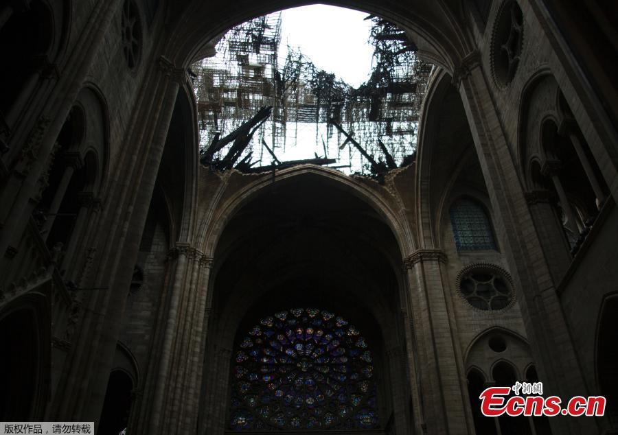 Photo taken on April 16, 2019 shows the partially collapsed vault above the nave of Notre-Dame Cathedral in Paris in the aftermath of a fire that devastated the cathedral.  (Photo/Agencies)