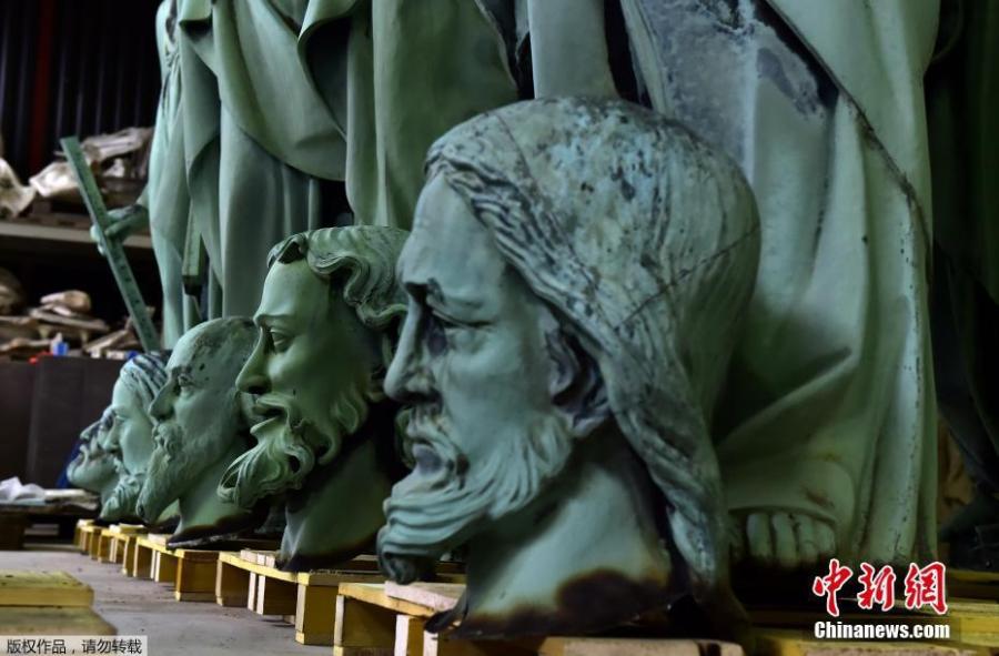 Photo taken in Marsac-sur-Isle near Bordeaux, on April 16, 2019 shows statues which sat around the spire of the Notre-Dame cathedral in Paris, stored in SOCRA workshop before restoration. (Photo/Agencies)