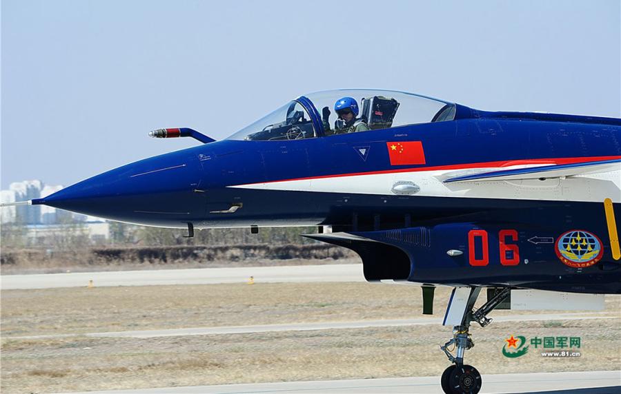 A plane taxis out of a hangar on April 10. (Photo/81.cn)